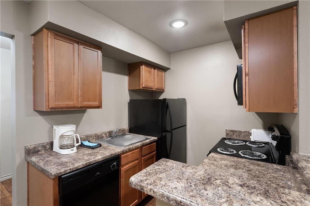 Eagle'S Den Suites Big Spring A Travelodge By Wyndham Room photo